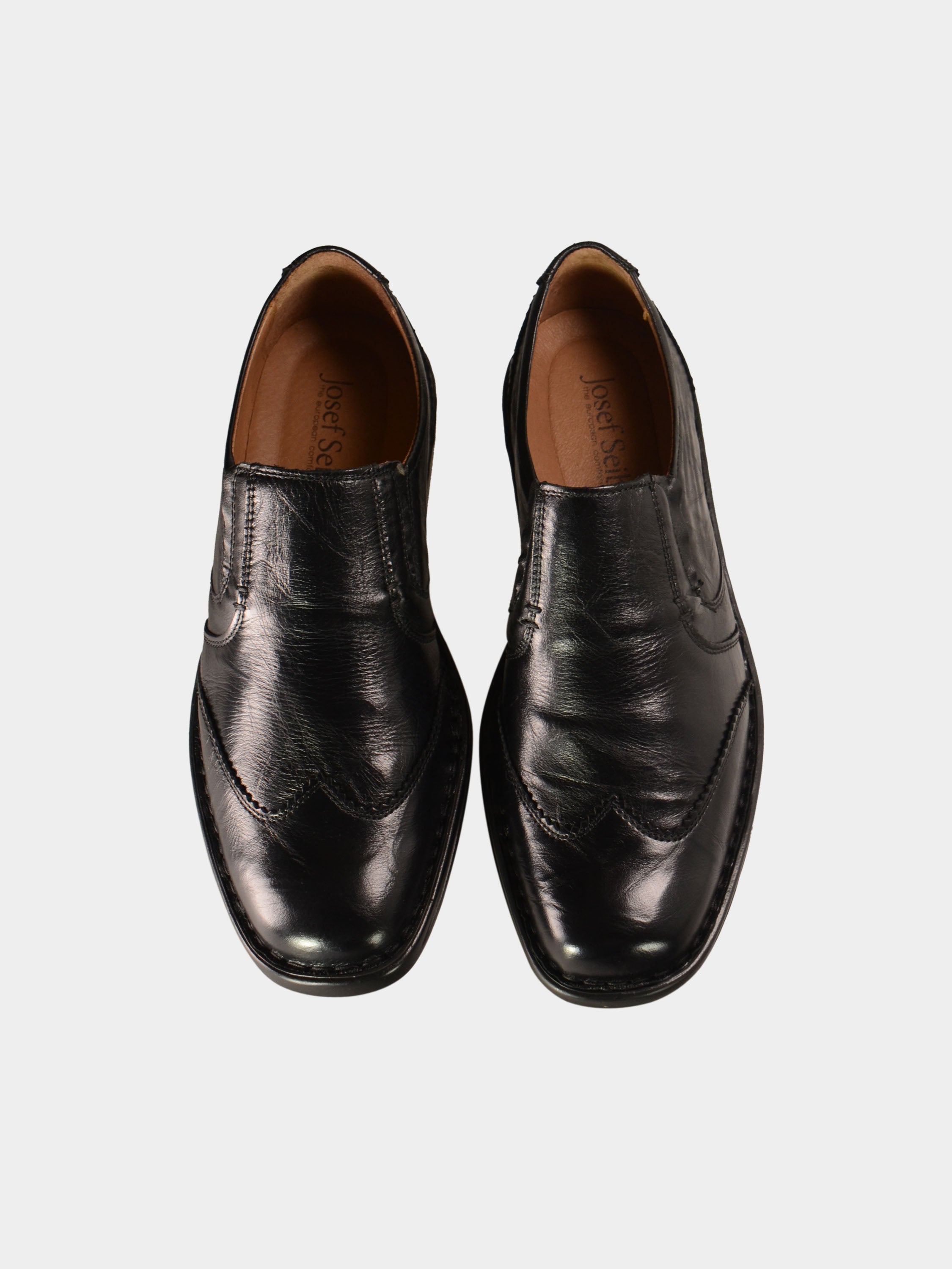 Josef Seibel Men's Douglas Wing Tip Slip On Shoes #color_Black
