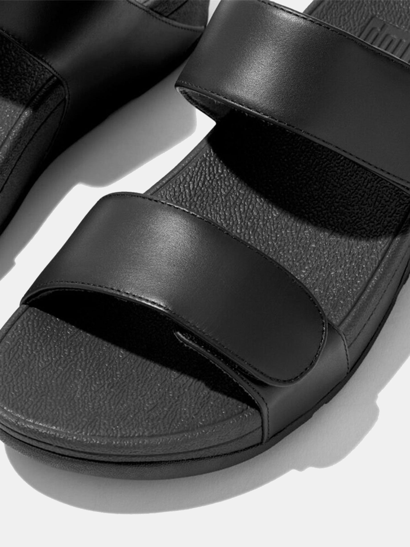 Fitflop Women's Lulu Adjustable Leather Slides #color_Black